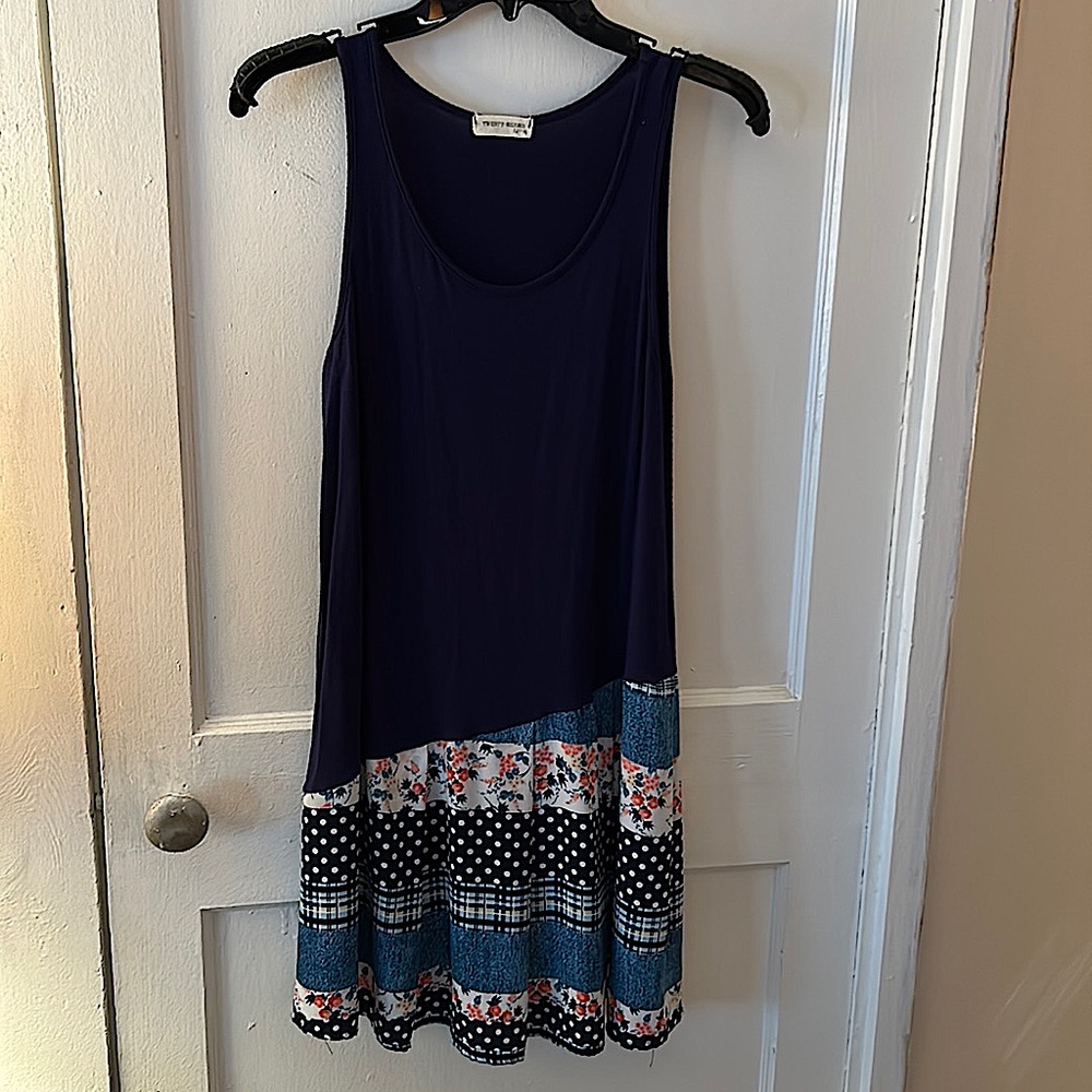 Women’s Dark Blue Peplum Dress with Prints.